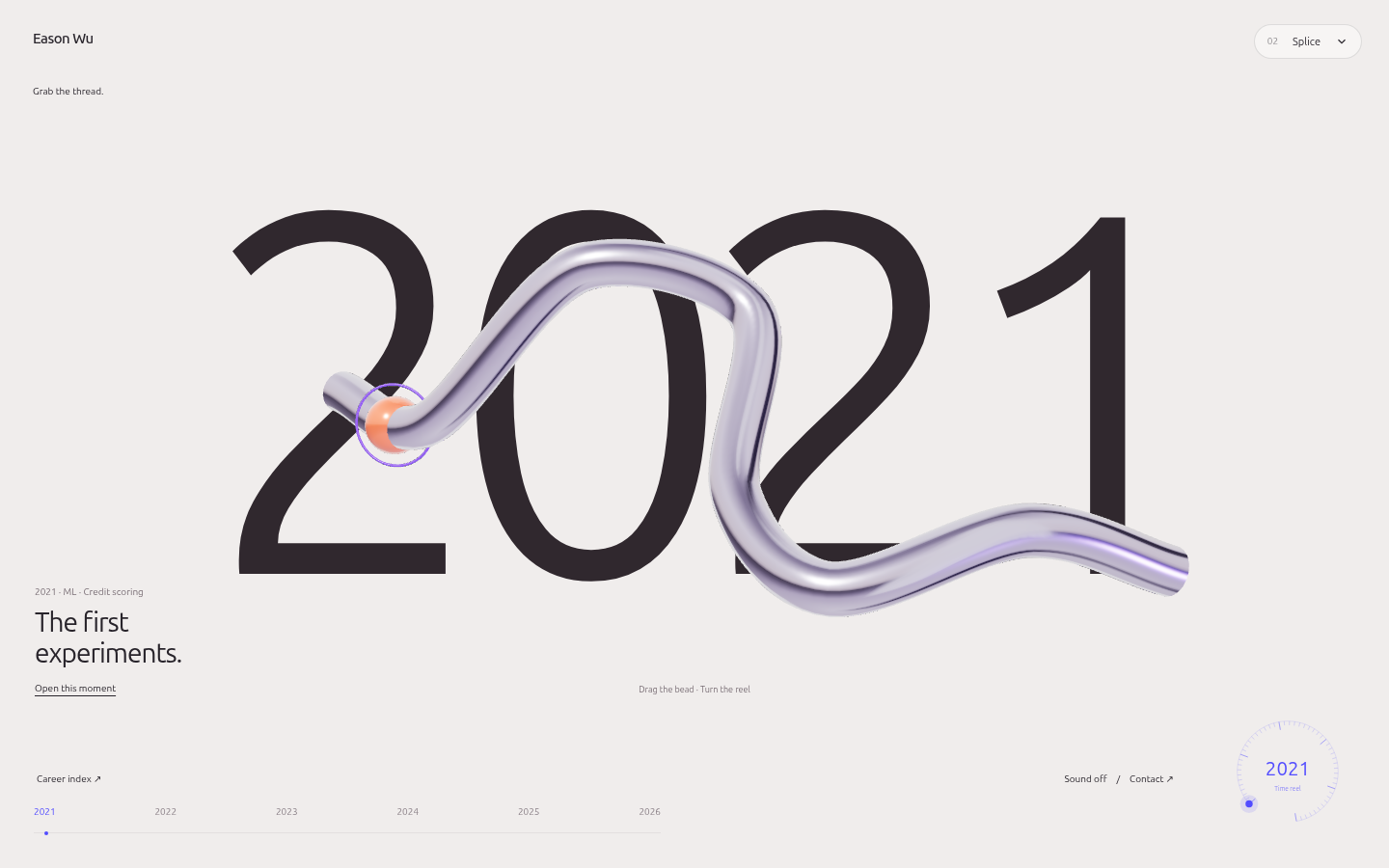 A metallic timeline sculpture with a tactile time reel